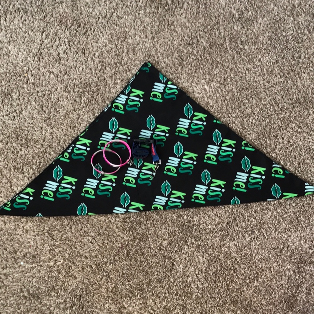 2 bracelets, a lanyard, and a bandanna